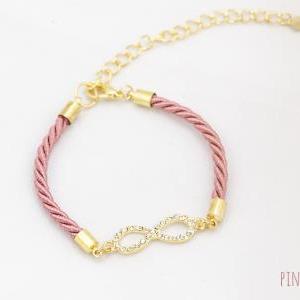Rhinestone Gold Infinity Bracelet With Coral Pink..