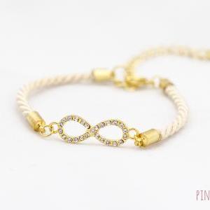 tiny infinity bracelet ivory , Rhin..