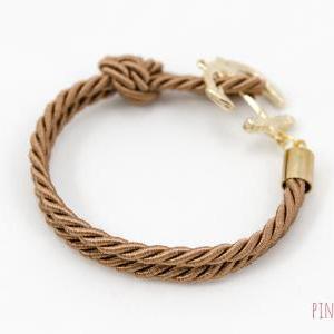 Gold Anchor Rope Bracelet With Dark Brown Color ,..