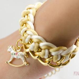Carousel With Ivory And Gold Woven Chain Bracelet..